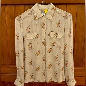 Women’s size medium silk blouse.